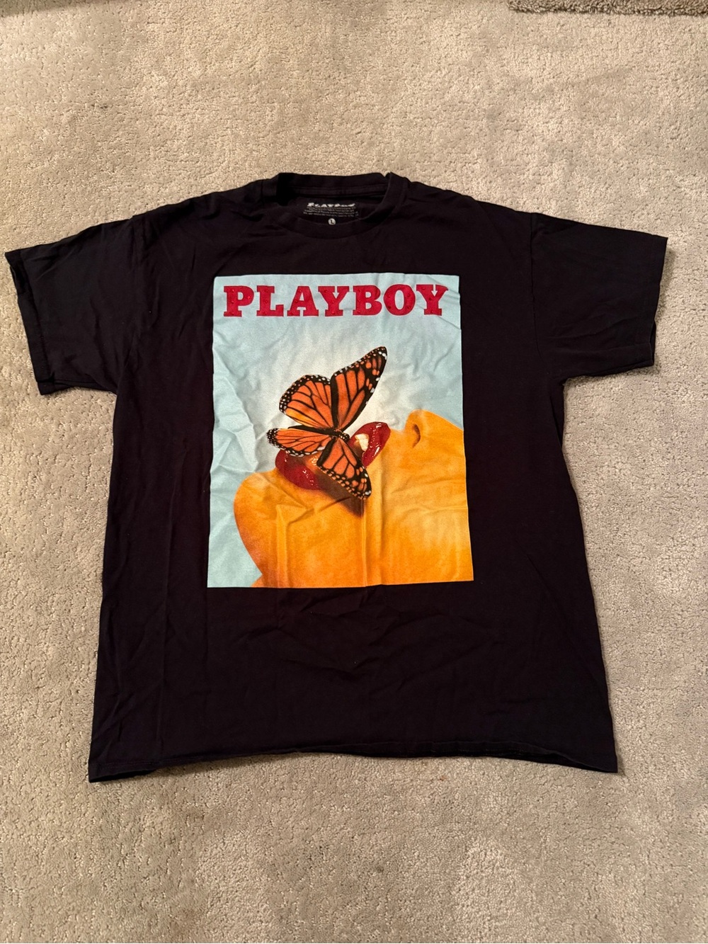PLAYBOY Black Tee with Red Logo and Orange Butterfly Art